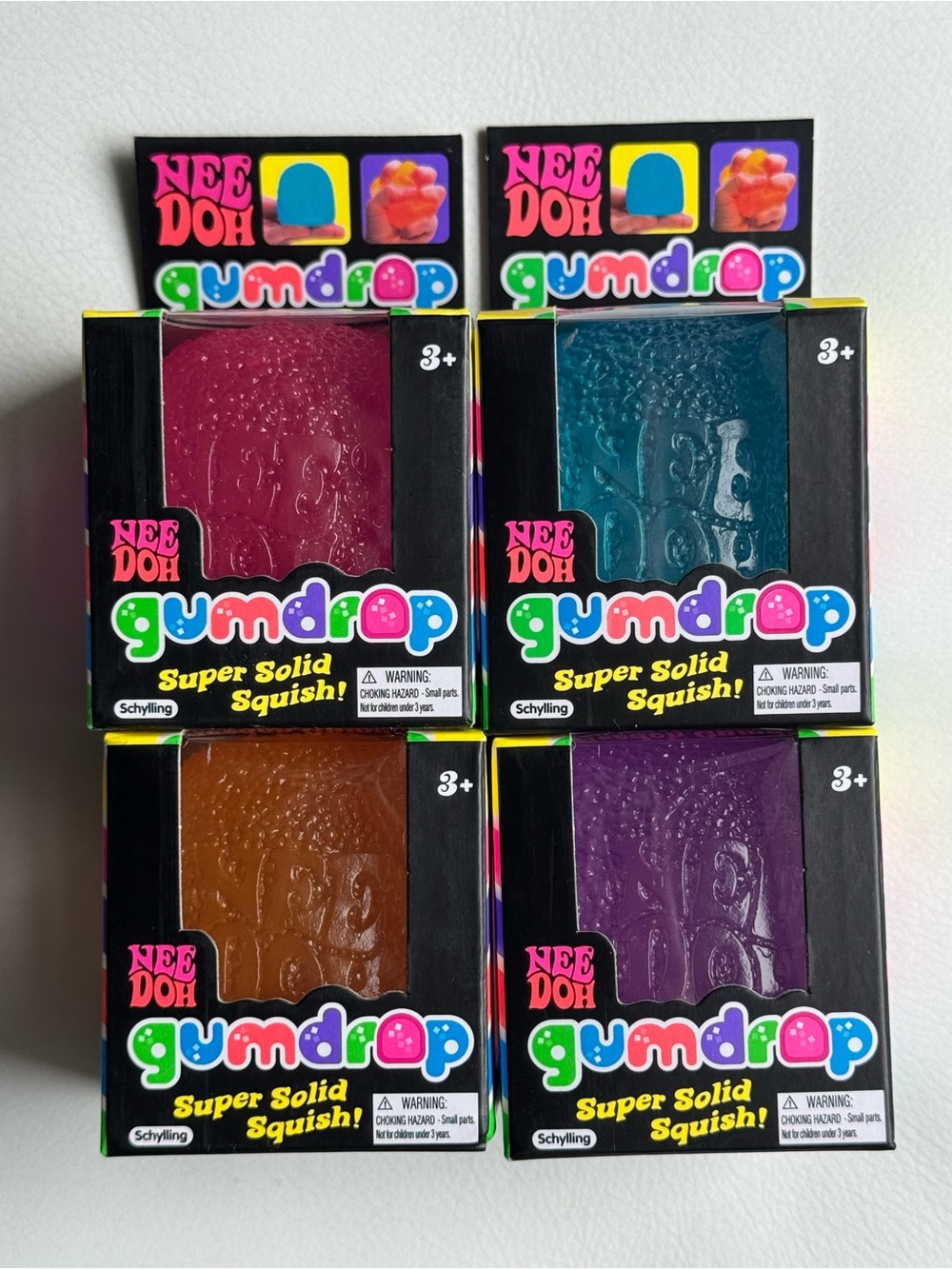 NeeDoh Gum Drops Lot Pink Purple Blue Orange Set of 4 Squishy Squeeze Toys